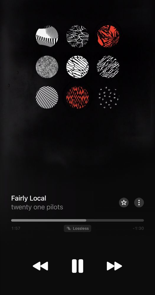 A screenshot of Apple music, the song playing is Fairly Local by Twenty One Pilots from the album Blurryface. It's 1 minute 57 seconds in, which if you watch the music video, is the best part of the song where Tyler Joseph flicks his eyes towards and away from the camera to the beat. 