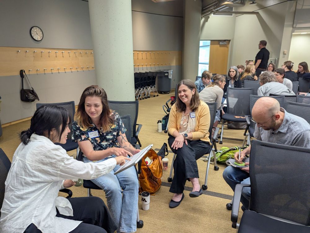 MSP LTER researchers in a small-group discussion about research questions.