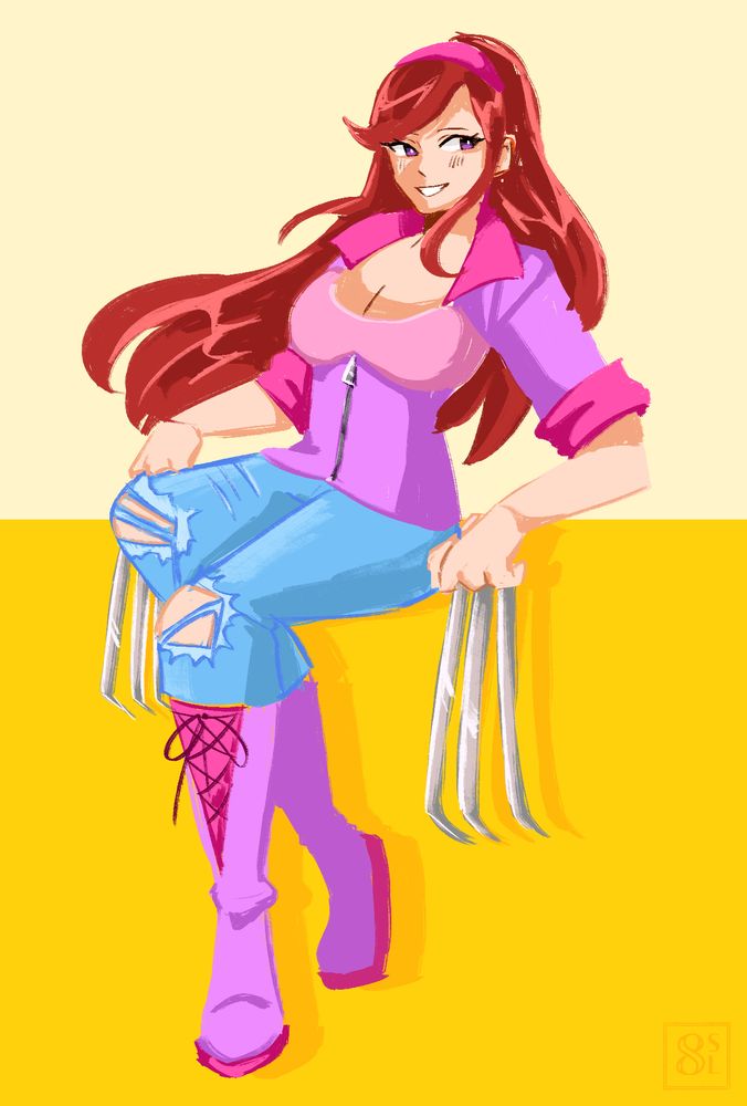 Lacey sitting on a yellow block background with her claws out.