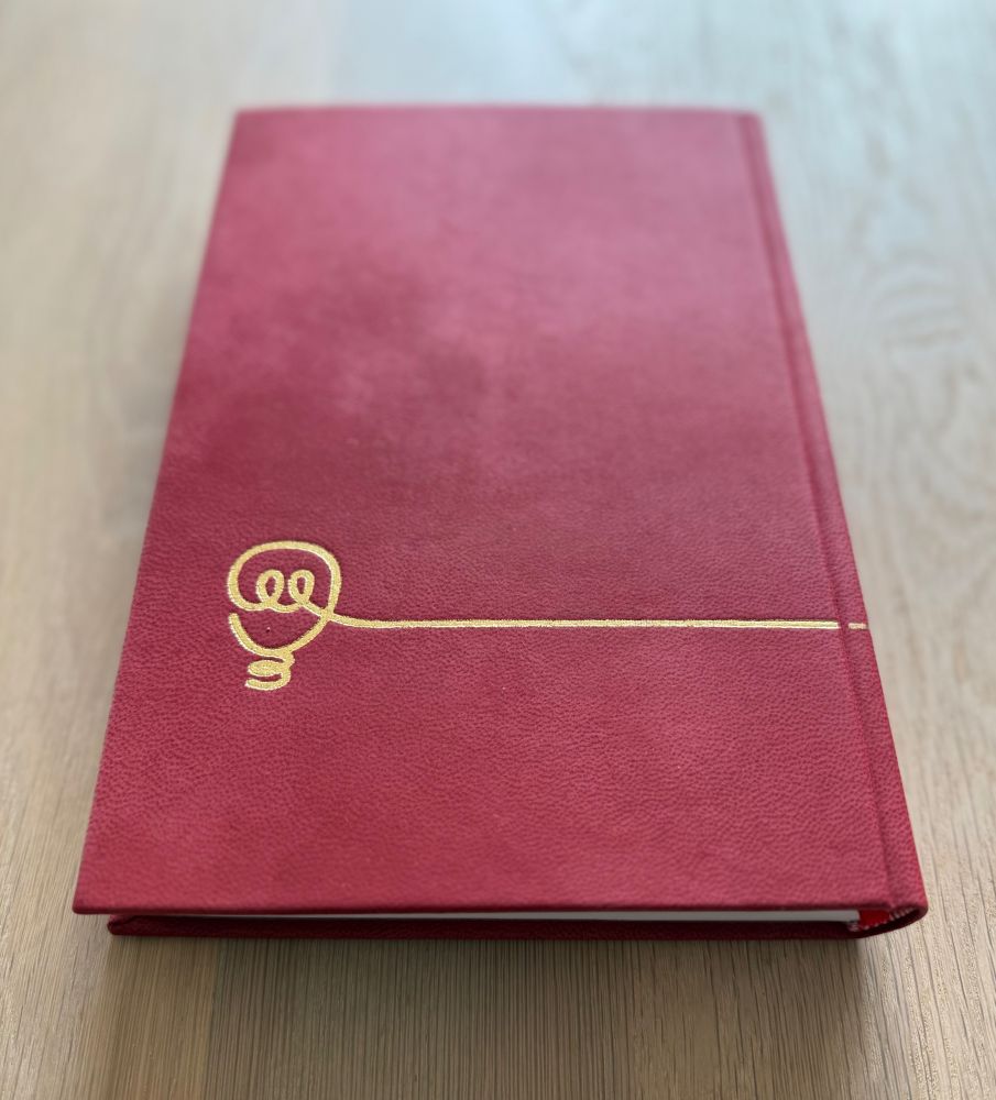 Back cover of a pleather-bound, limited-run version of the book "The Intentional Organization" by Sara Hicks & Mathias Meyer