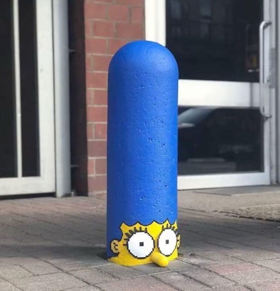 A Marge Simpson lookalike bollard.
