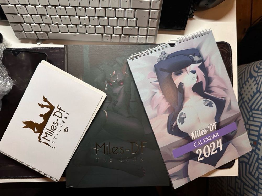 Pack of stickers, calendar and artbook from Miles-DF