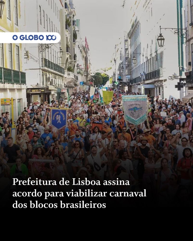Print do O globo com imagem de bloco de carnaval ao fundo escrito Prefeitura de Lisboa assina acordo para viabilizar carnaval dos blocos brasileiros 