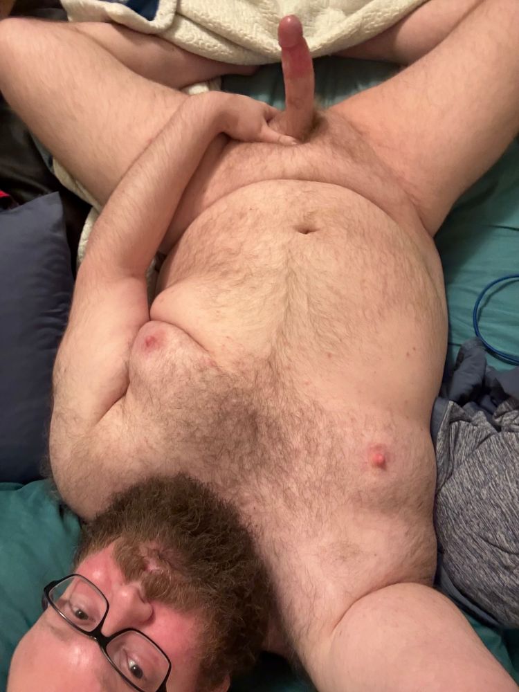 A hard cock and belly and fuzziness everywhere