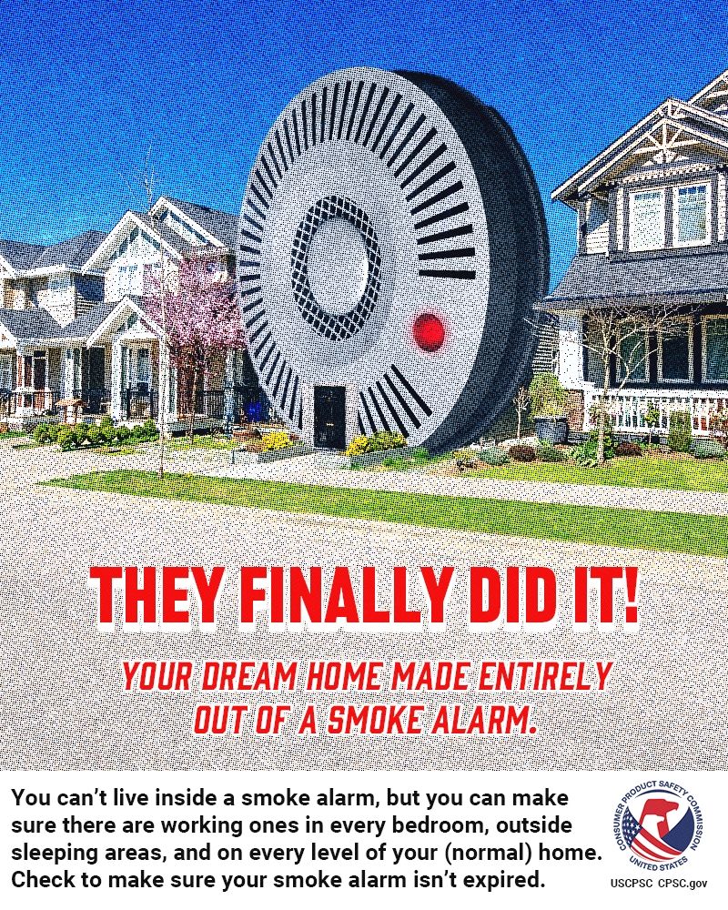 A house that looks like a giant smoke alarm on an otherwise normal street. The text reads: They finally did it! Your dream home made entirely out of a smoke alarm. You can't live inside a smoke alarm, but you can make sure there are working ones in every bedroom, outside sleeping areas, and on every level of your (normal) home. Check to make sure your smoke alarm isn't expired.