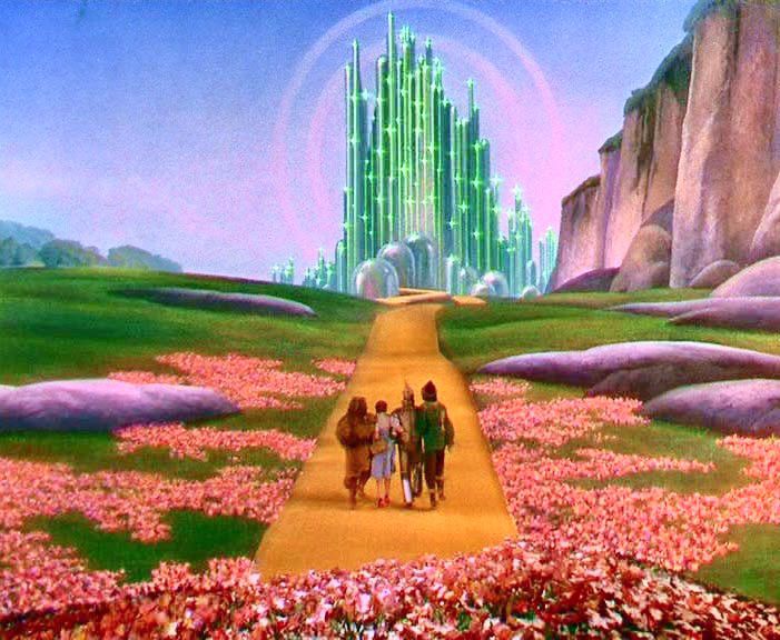 Dorothy and friends going down the yellow brick road toward the Emerald City  