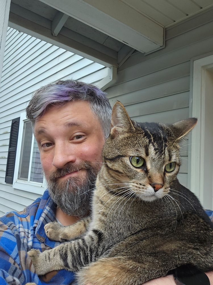 Just an guy and his big ol' cat