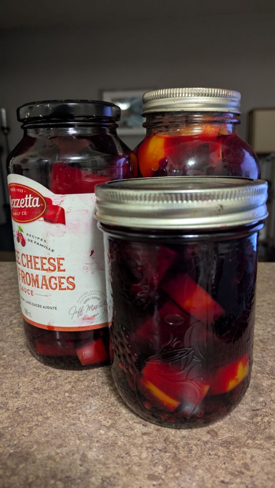 Three jars of pickled beets