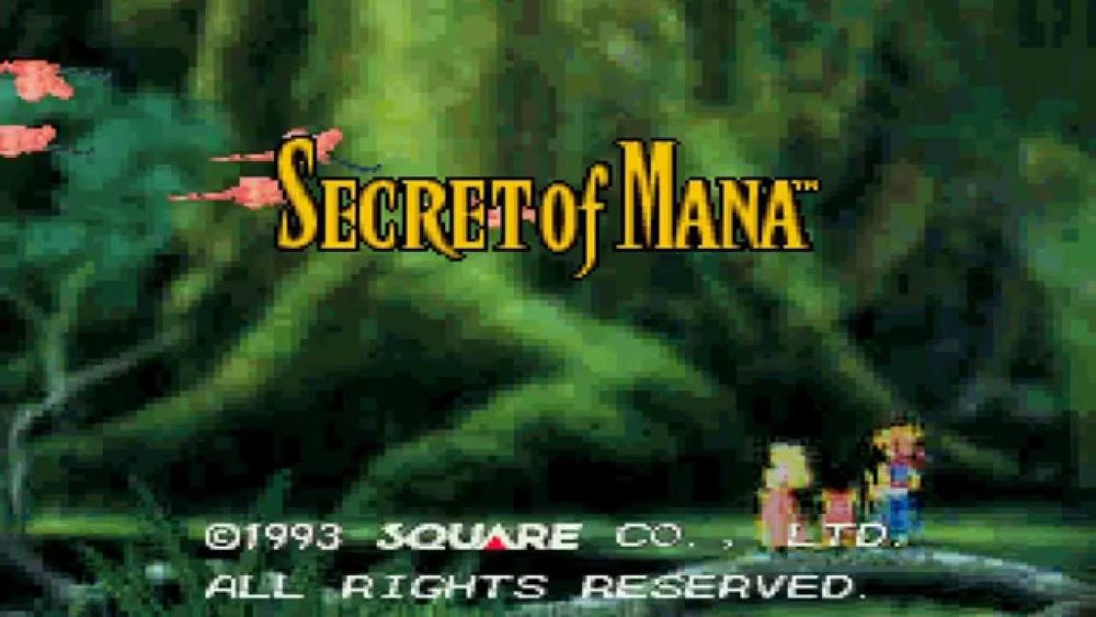 Ecran titre de l'action-rpg Secret of Mana, où l'on voit le héros et ses deux compagnons devant un arbre gigantesque