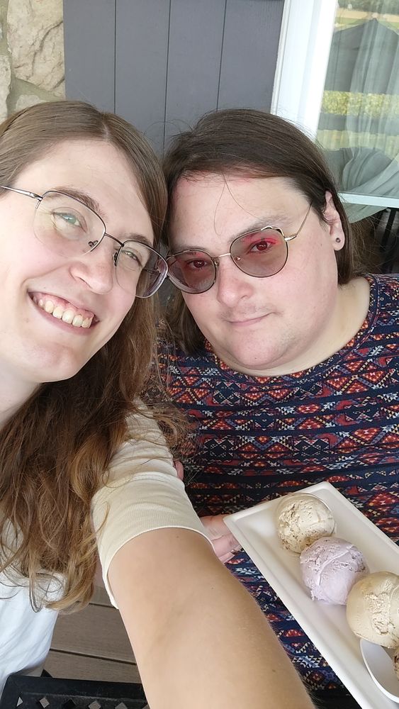 A photo of two women on an ice cream date