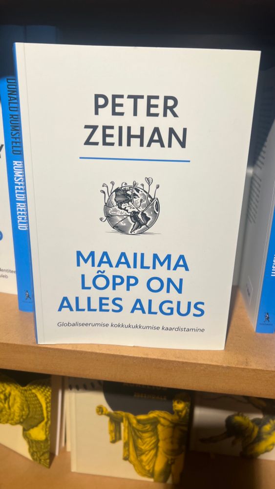Book with ivory cover and blue and black writing by author Peter Zeihan and title ‘maailma lõpp on alles algus, globaliseerumise kokkukukkumise kaardistamine’ or ‘The End of the World is Just the Beginning, Mapping the Collapse of Globalization’