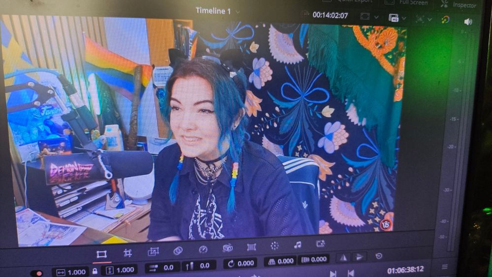 Jen in cat ears, mid cringe ick expression 