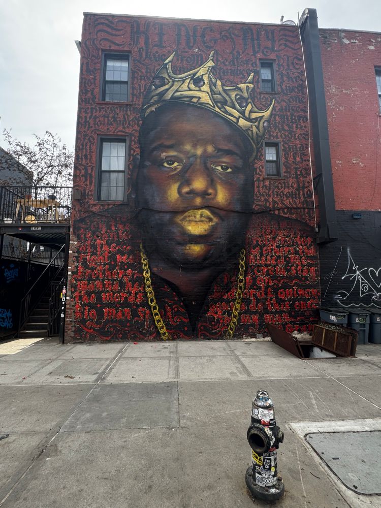 The Notorious BIG memorial in Bed-Stuy, New York. It is a huge 20 ft mural on the side of a house 