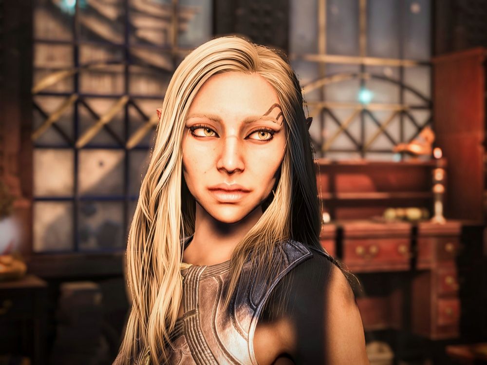 Elven woman with long blonde hair and face tattoos 