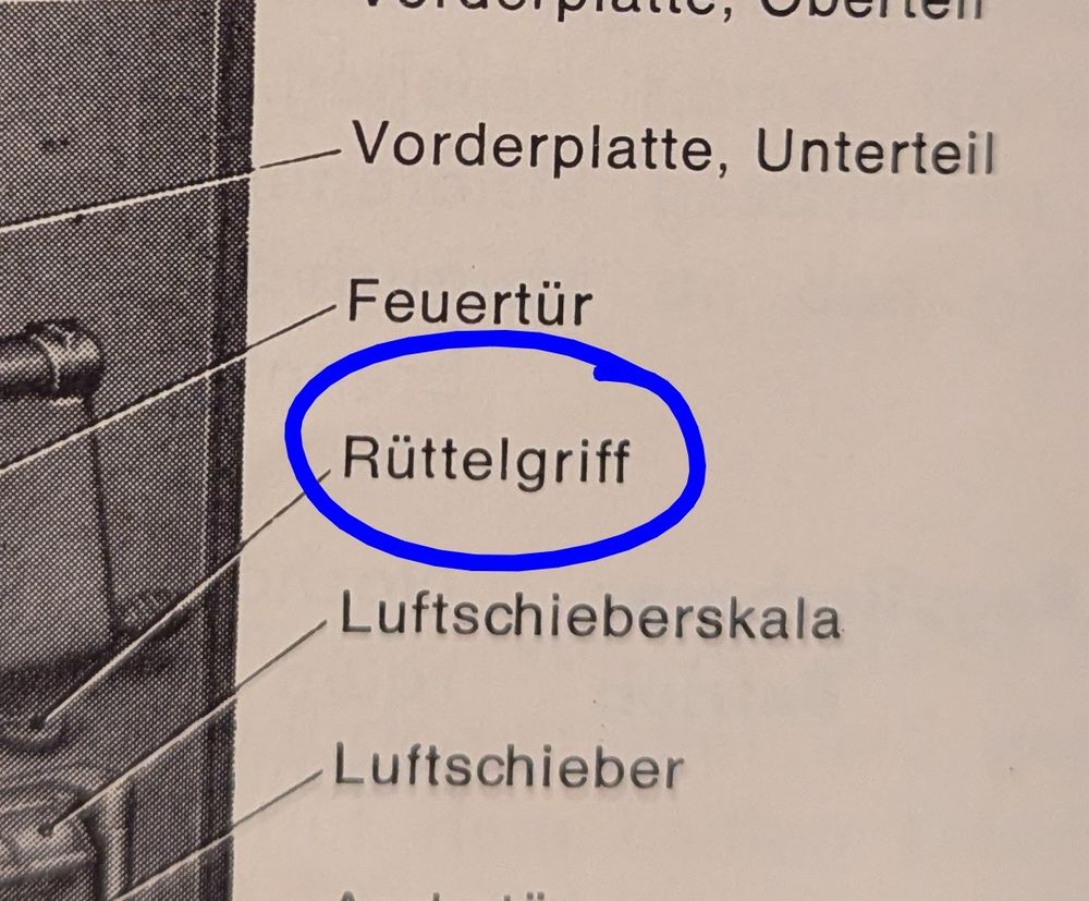 Foto eines Ausschnitts aus einer alten Anleitung für eine Heizungsanlage. Markiert ist das Wort "Rüttelgriff", da ich extrem infantilen Humor habe.