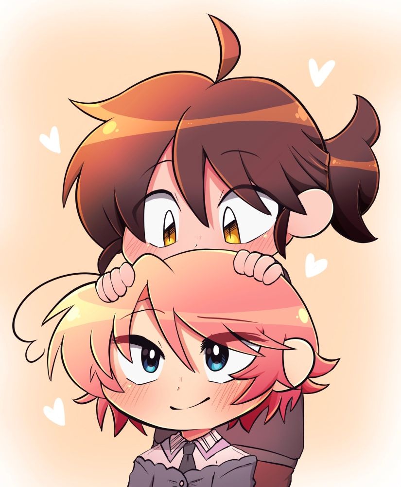 Parker peeking over West's head. 