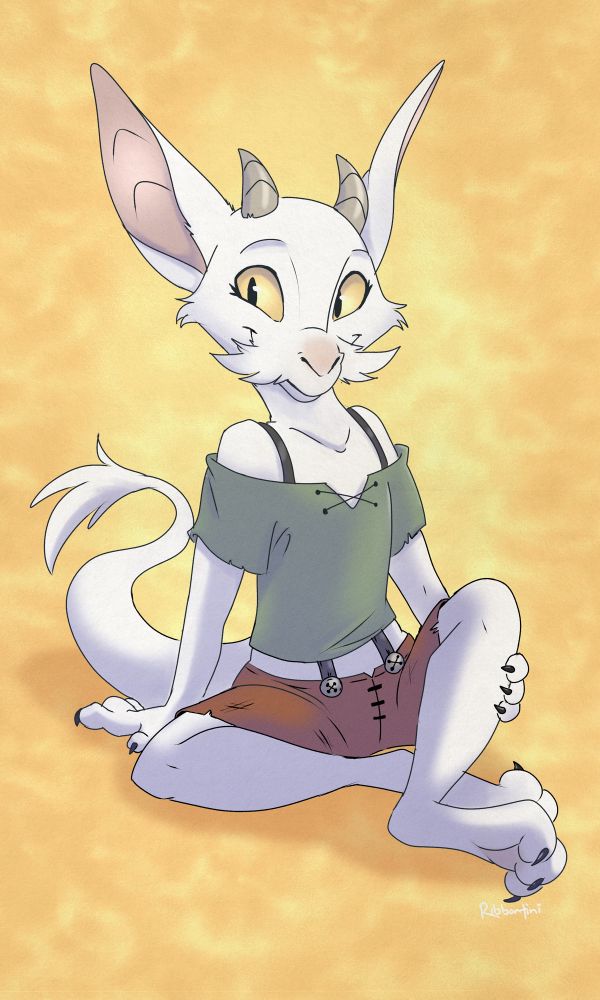 An illustration of a fluffy white kobold character, smiling at the viewer as she sits. Her outfit consists of a tattered green shirt and brown shorts, supported by suspenders with grey buttons.