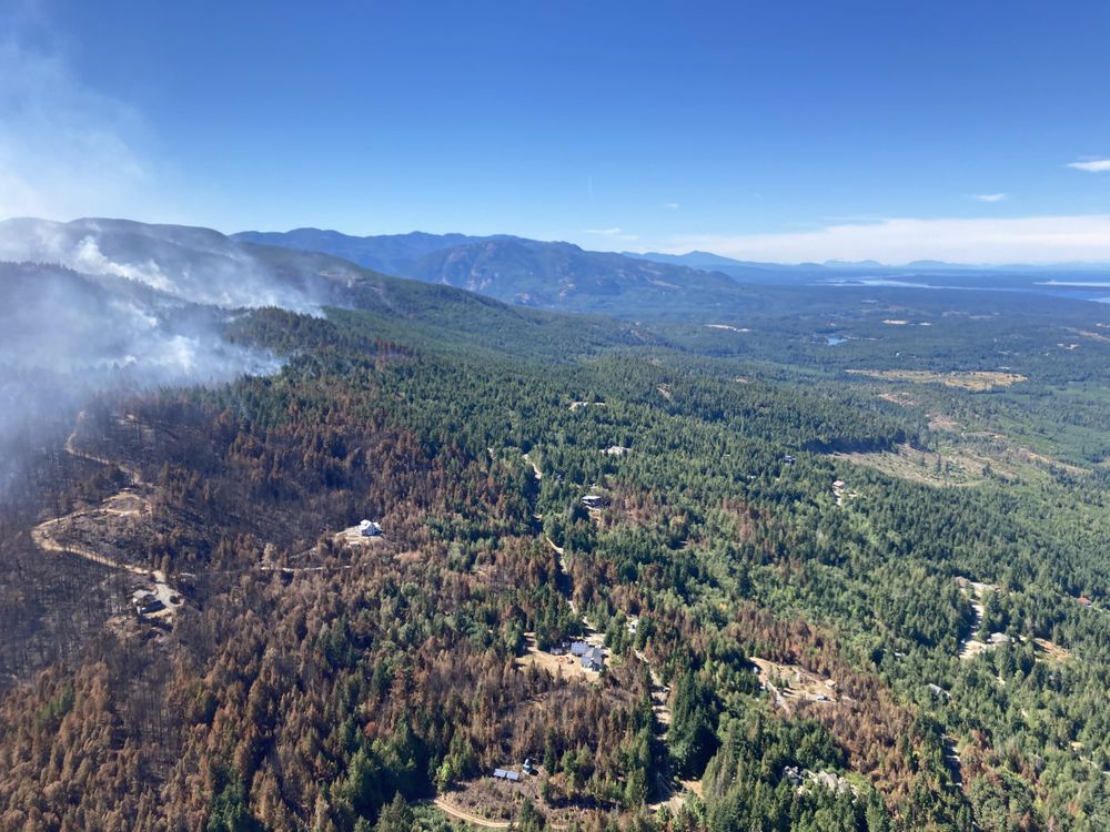 The BC Wildfire Service says the Wesley Ridge wildfire burning along the north shore of Cameron Lake is now classified as being held, a major shift from its previous out-of-control status.
