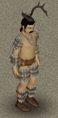 A screenshot of a Project Zomboid character wearing a headpiece with antlers, bone armour, teeth jewelry, fur underwear, and leather shoes.