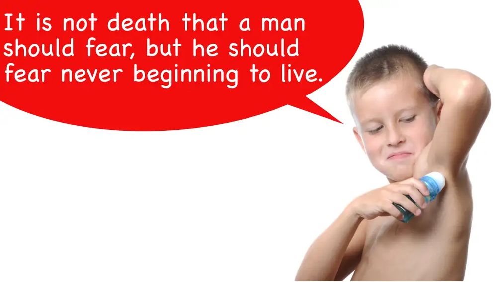 A young boy applies roll-on deodorant while saying 