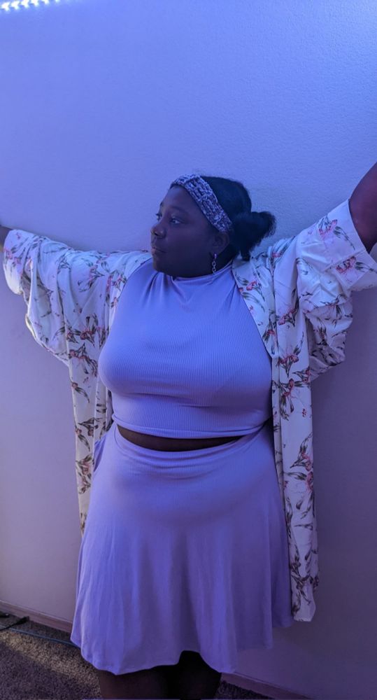 The most beautiful Lady ever in a periwinkle top and skirt with a white silk robe 