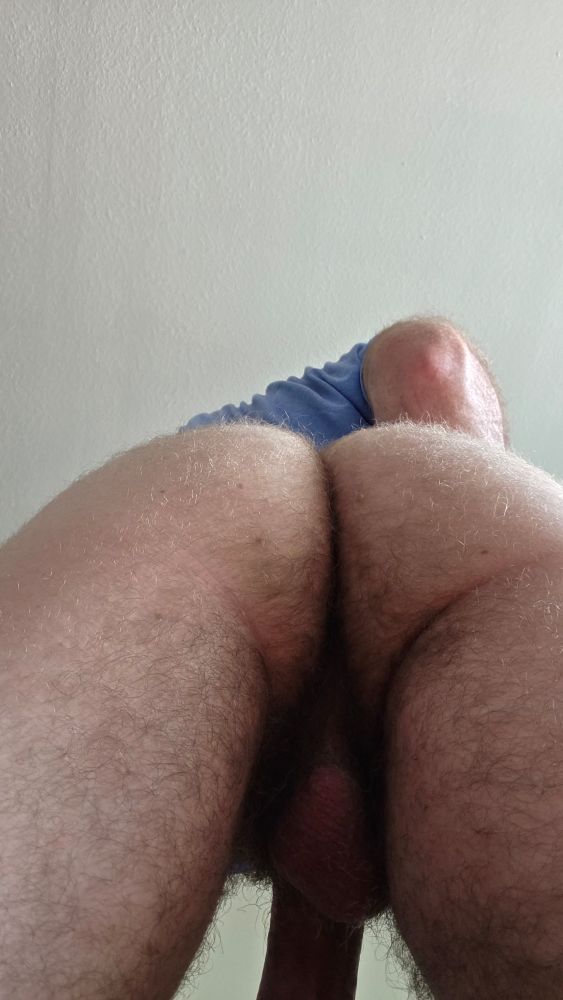 View looking up at my fuzzy cheeks. With a little bit of balls and a hard cock