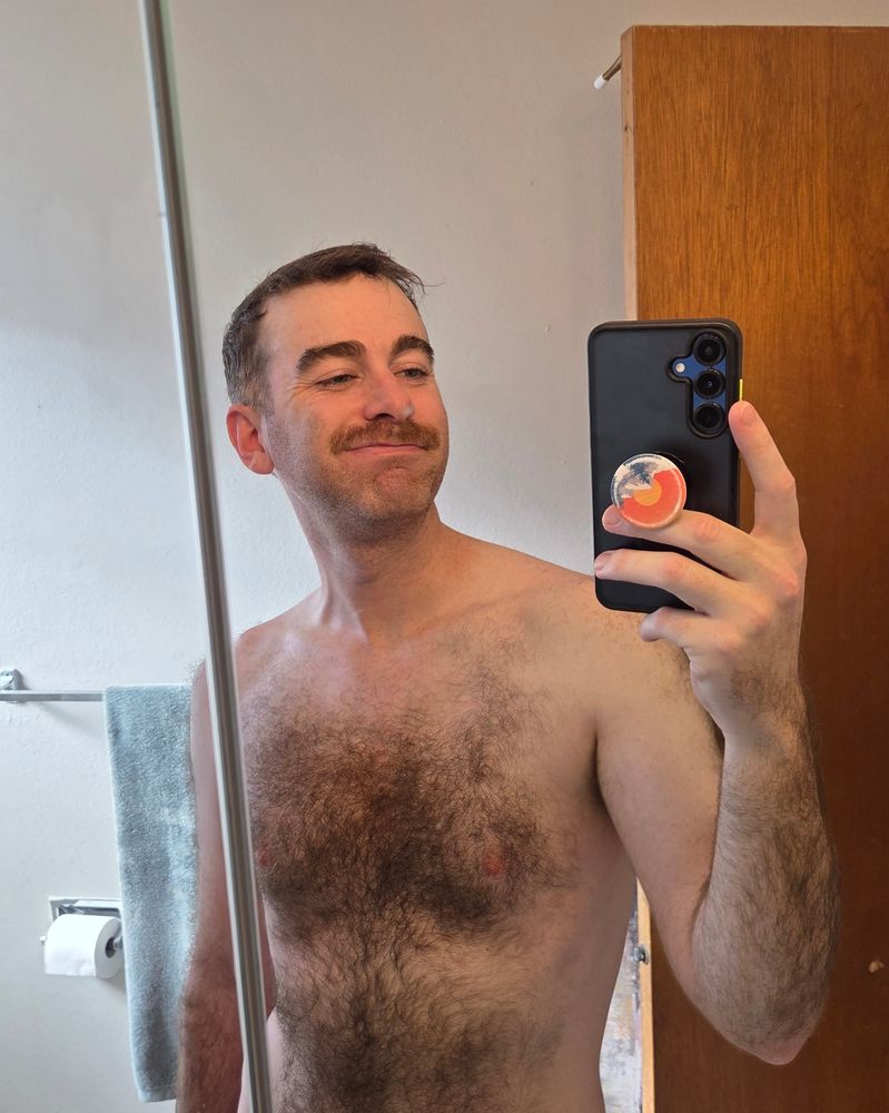 Shirtless mirror pic but from the belly button up 