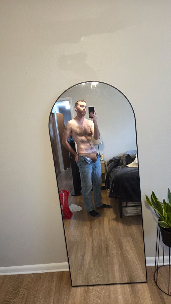 Mirror pic of full body wearing jeans with the fly open and my bulge sticking out wearing briefs, shirtless 