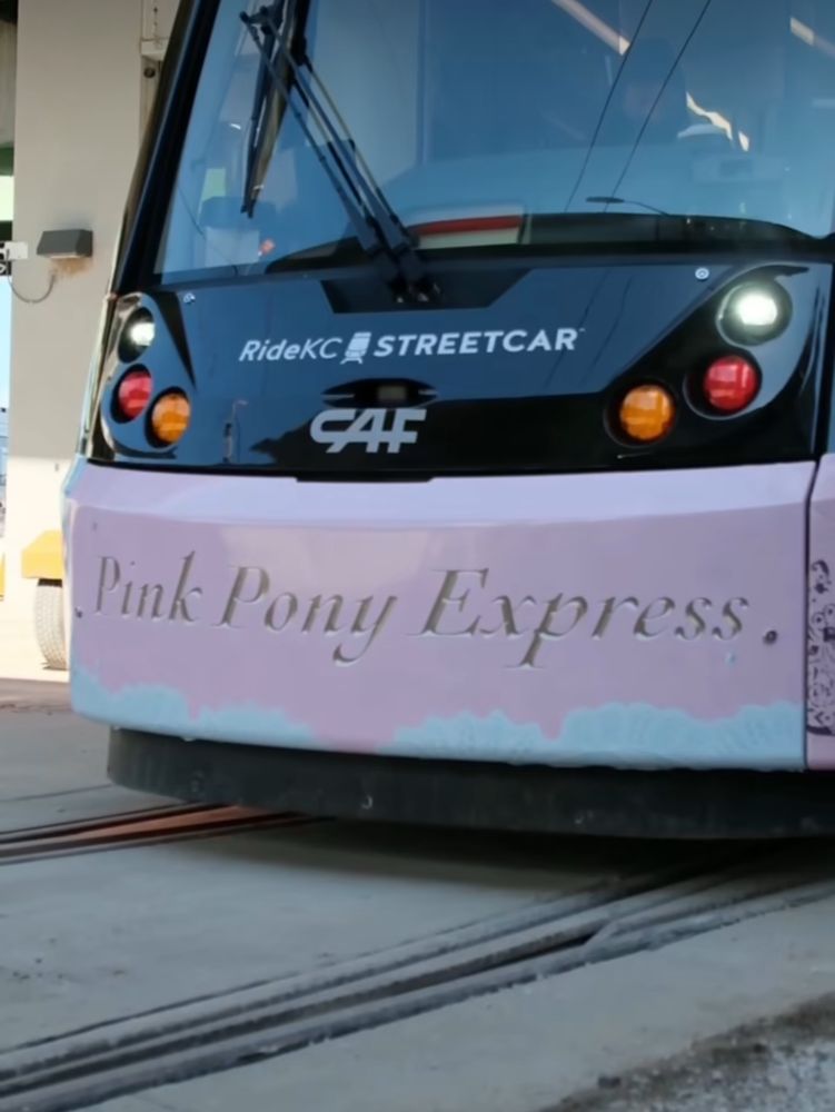 KC Streetcar wrapped in pink with “Pink Pony Express” written in gold in honor of Chappell Roan being in town October 4 & 5