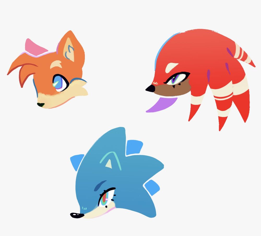 digital drawing of the heads of the members of team sonic. Top left shows Tails the fox. Top right is Knuckles the Echidna and the bottom is Sonic the Hedgehog 