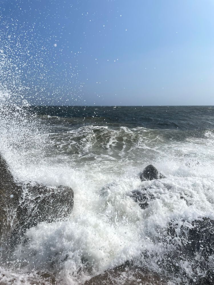 Ocean waves braking on a barrier. 