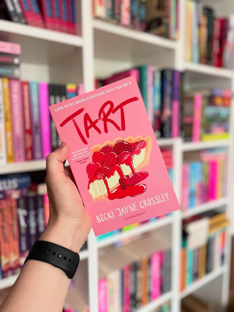 Book cover for Tart by Becky Jayne Crossley

Blurb:

Libby’s world shatters when a video of her ‘cheating’ on her popular boyfriend, Dan, goes viral the night he gets into a serious bike accident. Overnight, school friends turn into bullies and the only person who will talk to her is Neha, the new girl everyone else ignores.

While Dan is in a coma, oblivious to the drama unfolding around him, Libby and Neha grow closer. But Neha’s not ready to admit she’s been crushing on Libby for months. And if Libby follows her heart, she’ll be making her already messy life a lot messier.
