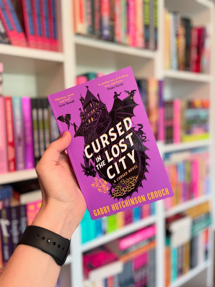 Book cover for Cursed In The Lost City by Gabby Hutchinson Crouch

Blurb:

“It’s 1599. Fang and Lazare are on the run with their friends Amber, Nell and half-fae child Tem. The news that Tem possesses the power to make humans immortal is spreading across London like wildfire – and has even reached the ears of the ailing Queen Elizabeth Tudor.”