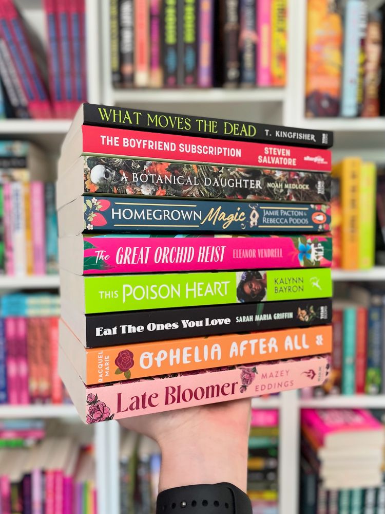 A stack of LGBTQ+ books for plant gays

▪️ What Moves The Dead by T Kingfisher – fungal growths and possessed wildlife
▪️ The Boyfriend Subscription by Steven Salatore – sex workers, plant gays and hookups
▪️ A Botanical Daughter by Noah Medlock – botany meets taxidermy 
▪️ Homegrown Magic by Jamie Pacton & Rebecca Podos – cosy garden magic
▪️ The Great Orchid Heist by Eleanor Vendrell - debt, orchids and romance
▪️ This Poison Heart by Kalynn Bayron – family secrets and plant magic
▪️ Eat The Ones You Love by Sarah Maria Griffin – plants, desire and retail
▪️ Ophelia After All by Racquel Marie – roses, highschool and queerness
▪️ Late Bloomer by Mazey Eddings – artists, flower farms and cosy romance
