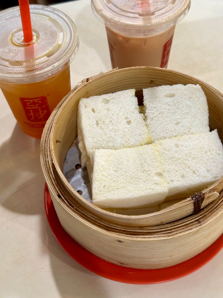 Kaya toast in a bamboo steamer.