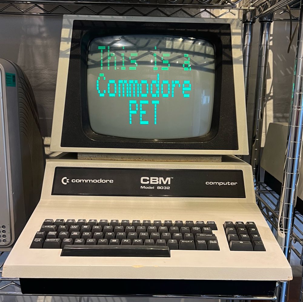 It’s a computer screen, showing the words “this is a commodore PET” (the brand of computer)
