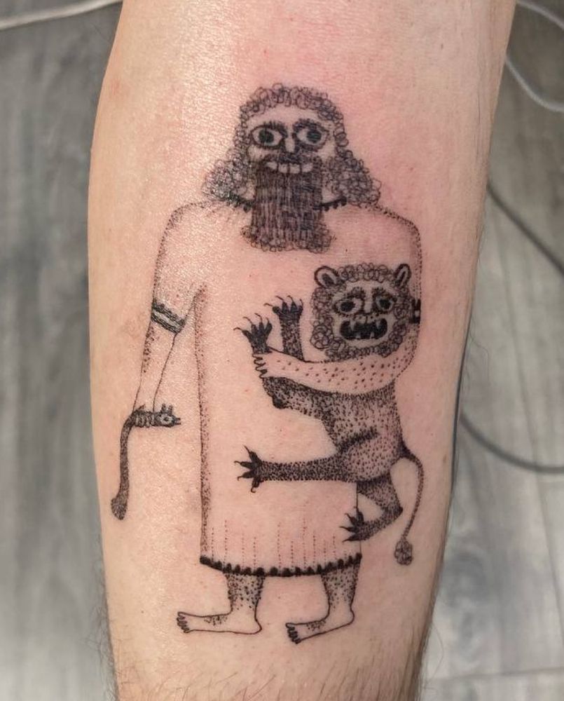 Tattoo of Gilgamesh holding a lion