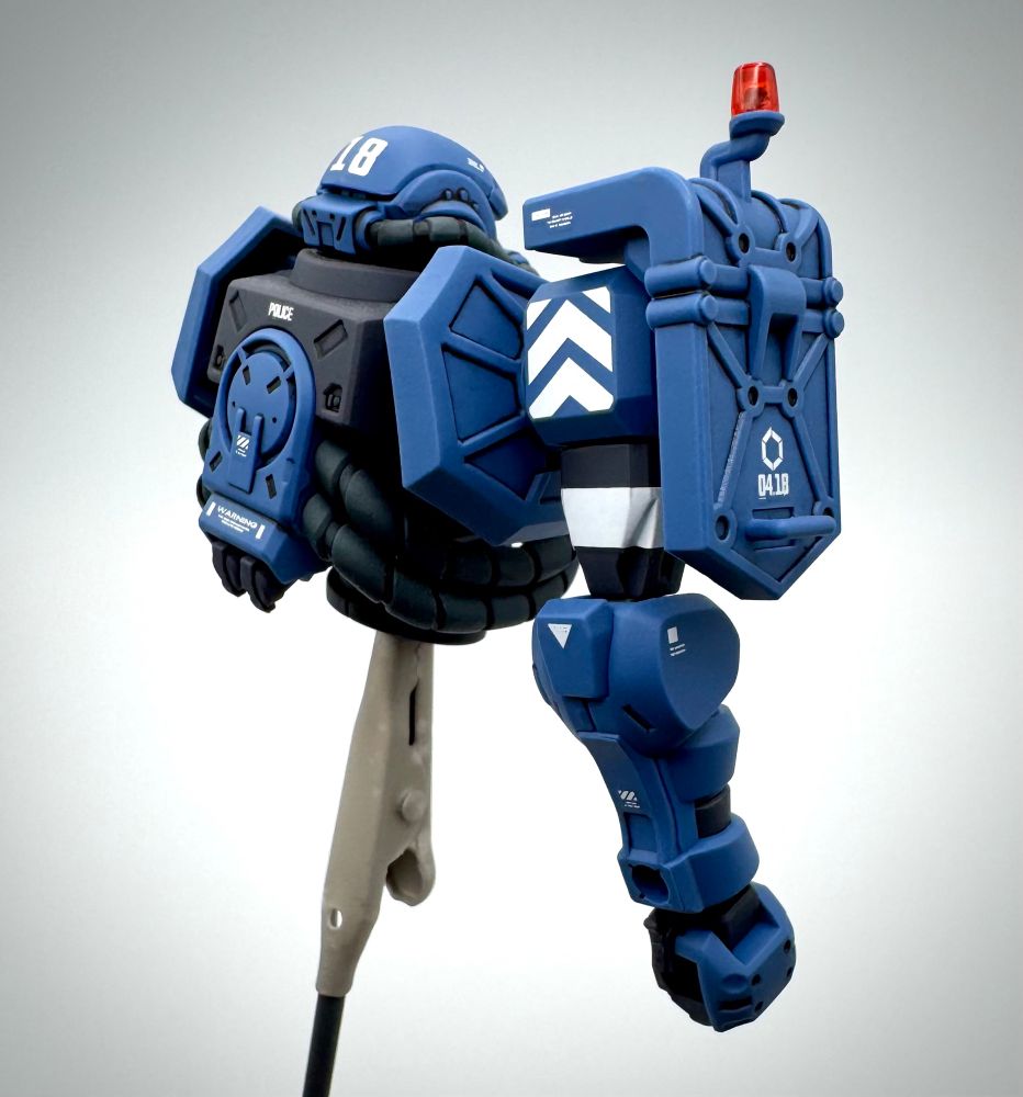 HG GQ 1/144 Police Zaku with completed head, body, and right arm