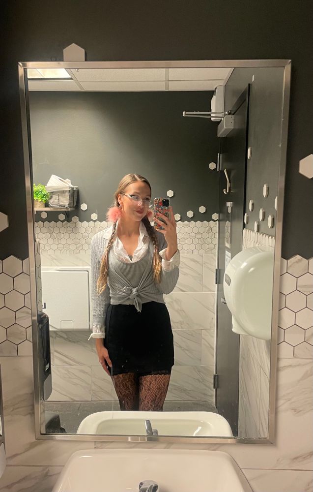 mirror selfie of me dressed as Britney Spears from the “baby one more time” video