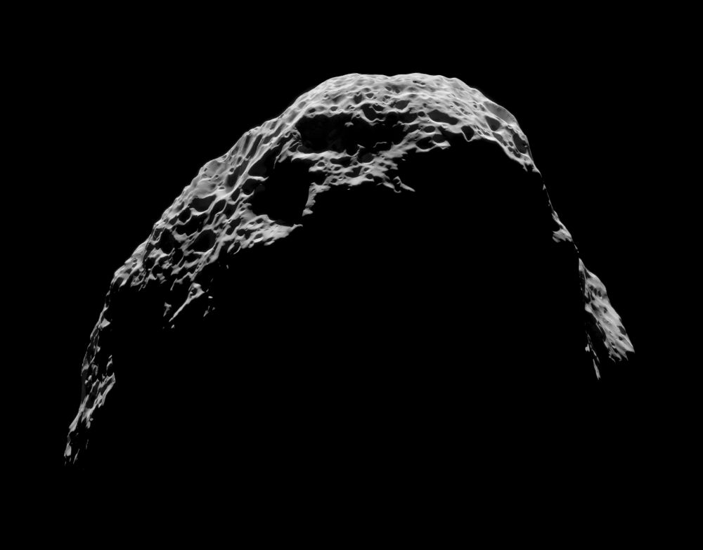 A lumpy crescent of a moon with deep craters and pits. 

NASA/JPL-Caltech/SSI/CICLOPS/Kevin M. Gill