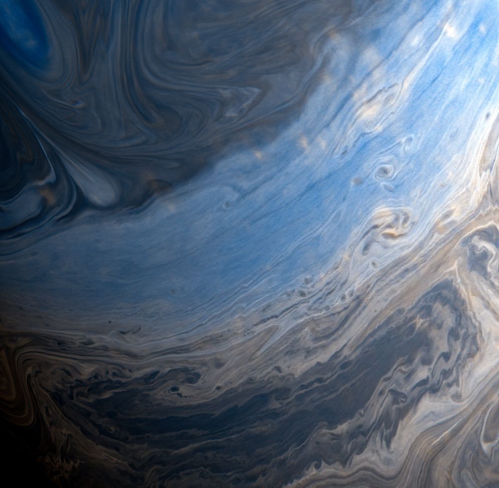 Swirls of blues and grays.

NASA/JPL-Caltech/SSI/CICLOPS/Kevin M. Gill