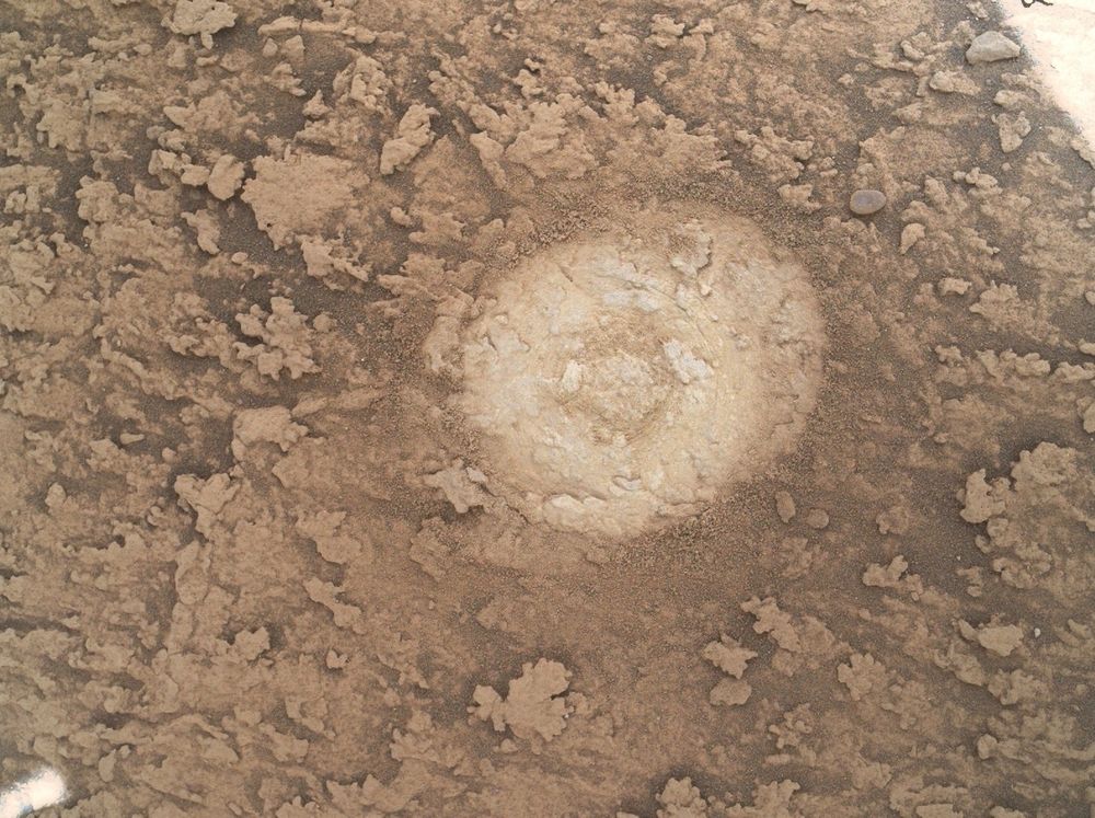 A rock with a circular patch cleared of dust.

NASA/JPL-Caltech/MSSS/Kevin M. Gill