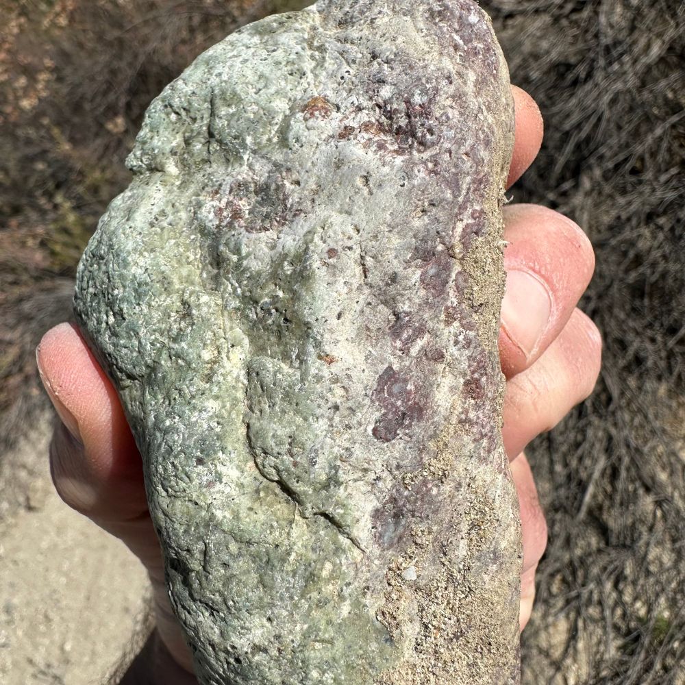 A rhyolite(?) with green and maroon sides