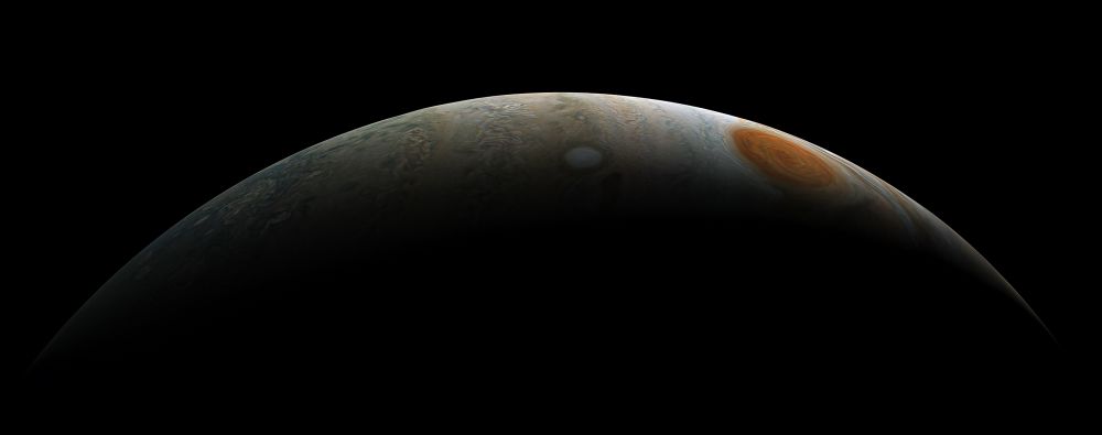 A crescent view of southern Jupiter. The Great Red Spot is visible towards the right.

NASA/JPL-Caltech/SwRI/MSSS/Kevin M. Gill