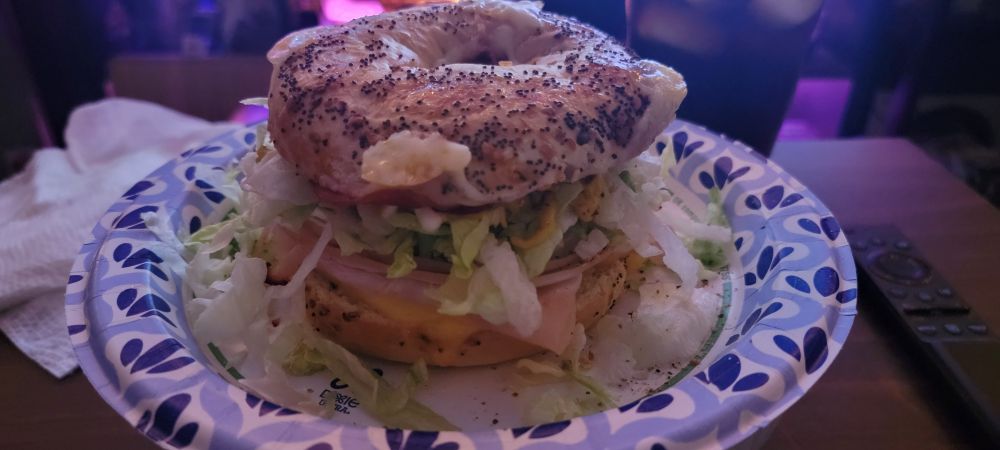A big ass GAMER bagel sandwich with ALL the lettuce