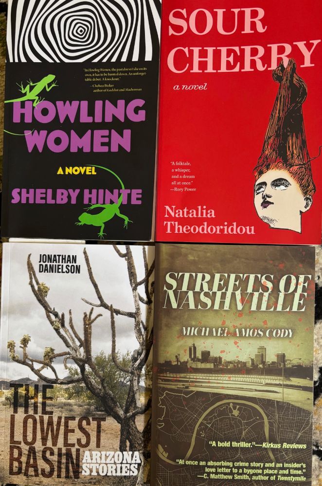The books covers of HOWLING WOMEN by Shelby Hinte, SOUR CHERRY by Natalia Theodoridou, THE LOWEST BASIN by Jonathan Danielson and STREETS OF NASHVILLE by Michael Amos Cody