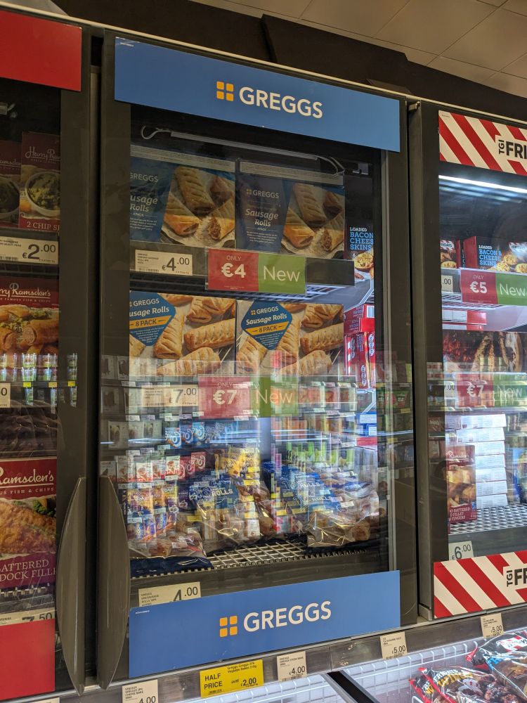 Photo of a supermarket frozen food isle in Ireland with a section devoted to Greggs pastry products