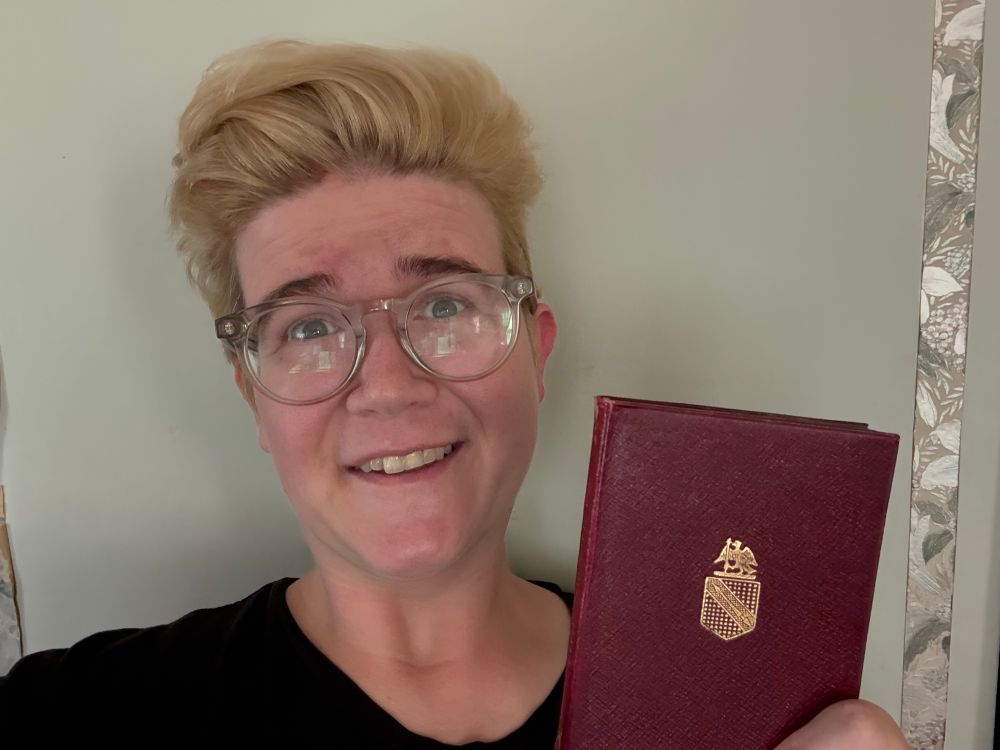 a selfie with Aud holding a Temple Shakespeare edition of the sonnets by William Shakespeare 