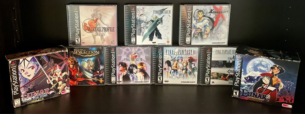 A collection of PlayStation 1 JRPGs. They are from left to right: Lunar Silver Star Story, Valkyrie Profile, the Legend of Dragoon, Final Fantasy 7, 8, 9, & Chronicles, Xenogears, and Lunar 2 Eternal Blue.