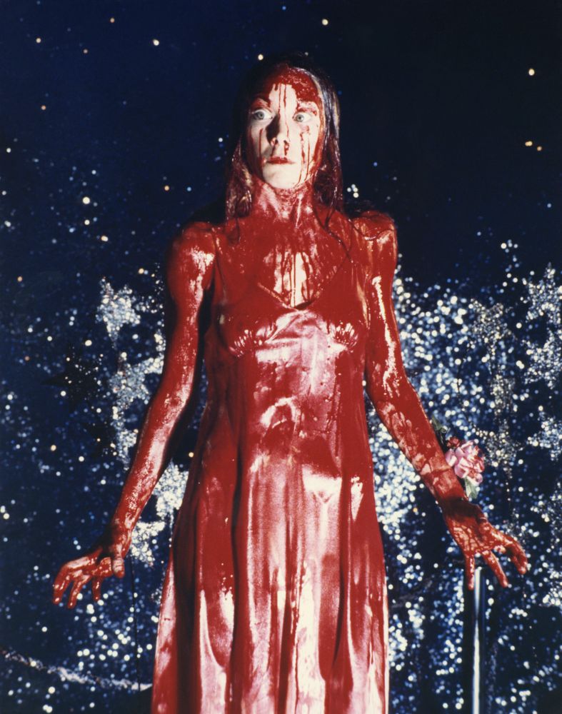 Sissy Spacek as Carrie White covered in pigs blood